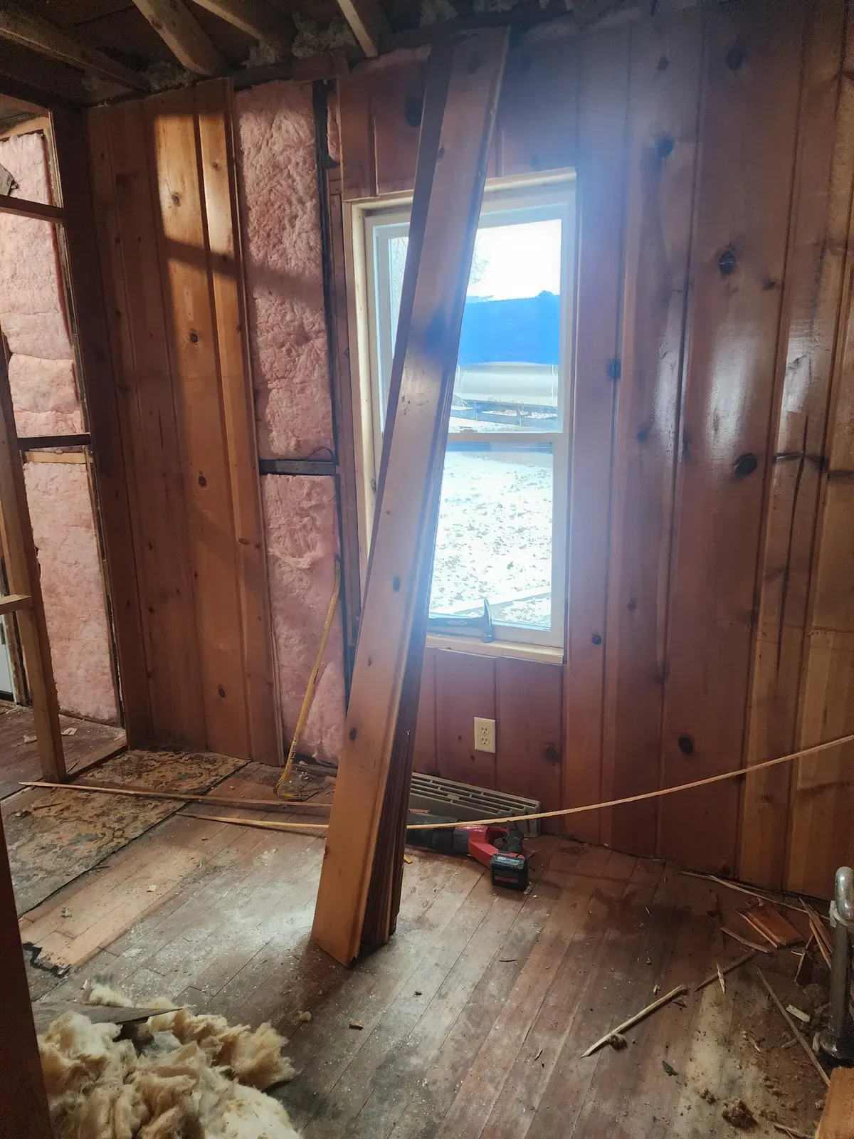 Window wall demo during the cabin remodel