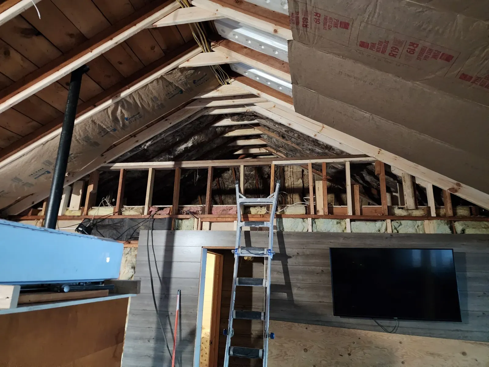 Loft wall framing during the cabin remodel