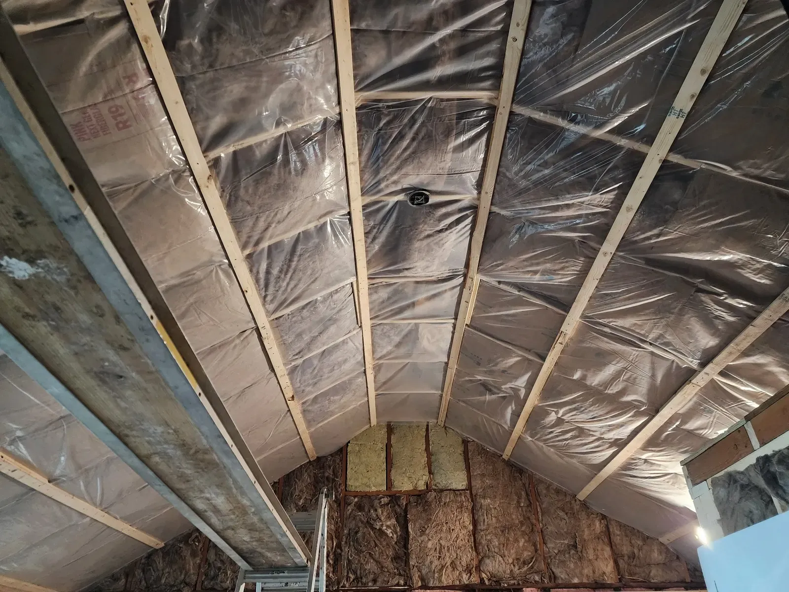 Vaulted ceiling insulation during the cabin remodel