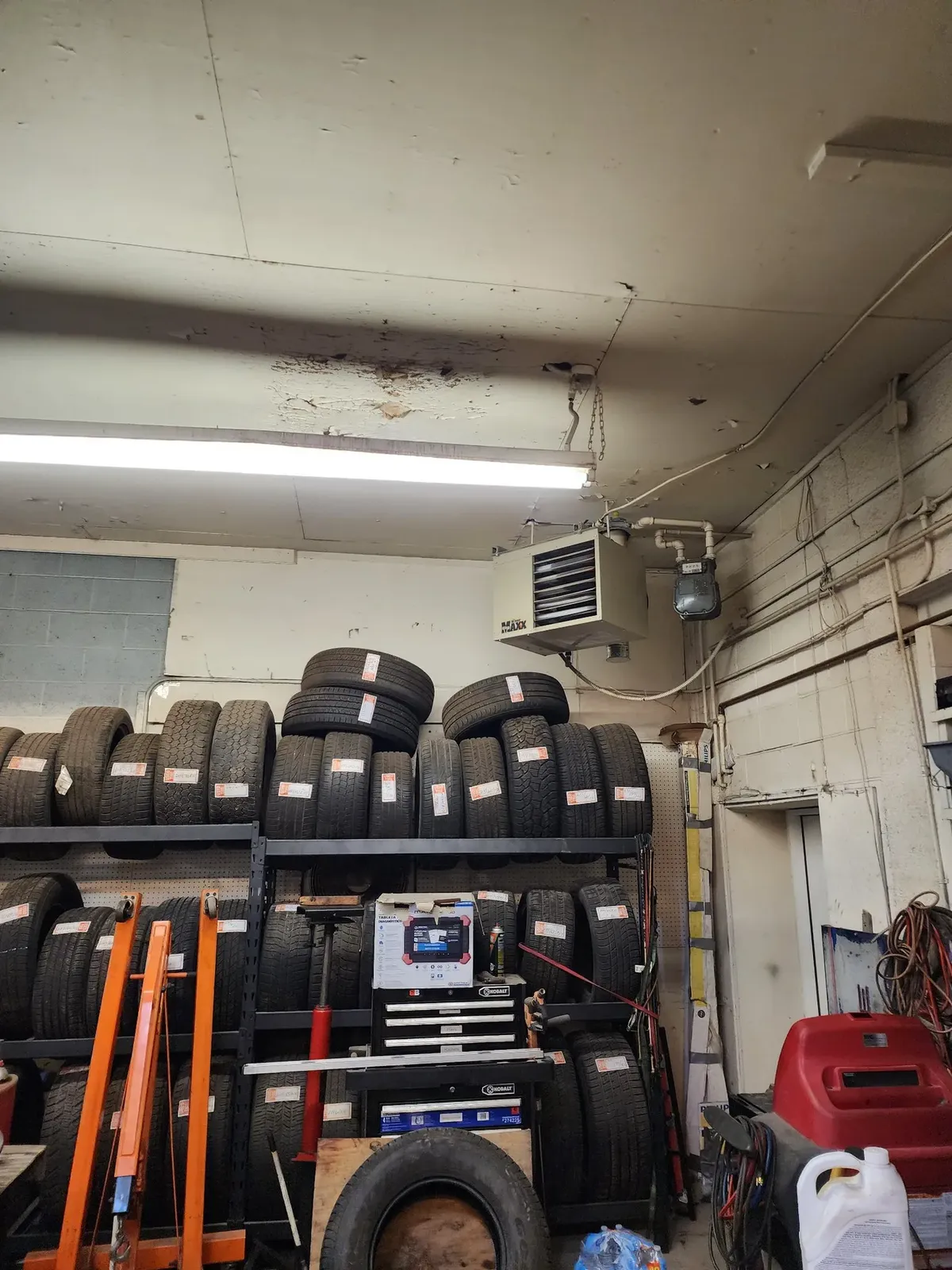 Former tire shop garage before conversion into the hockey performance center