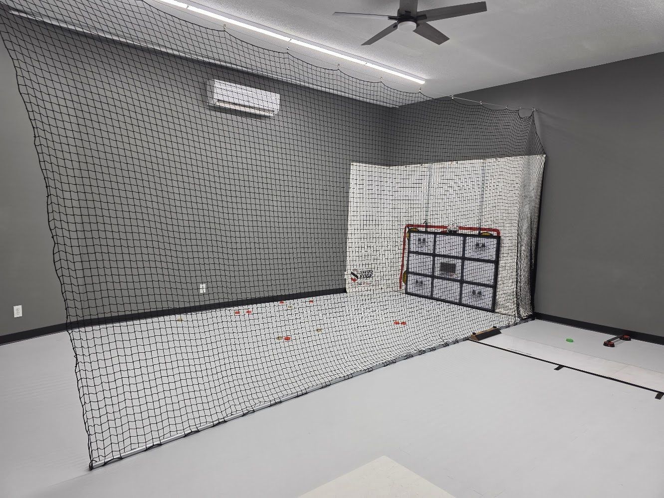 Finished hockey training net fitted with shooting targets