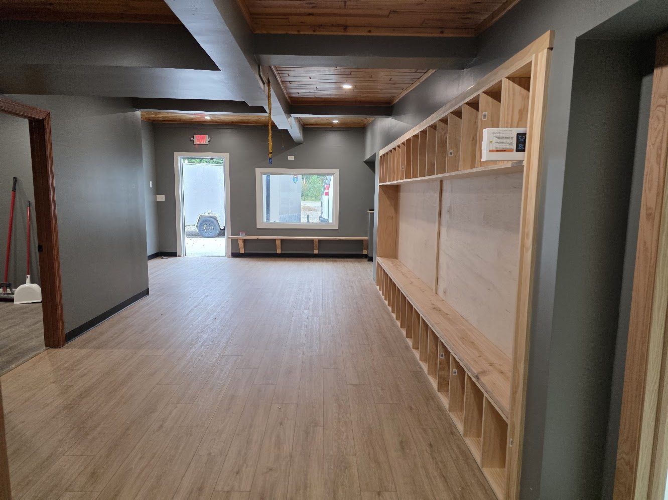 Finished locker room with custom open cubbies