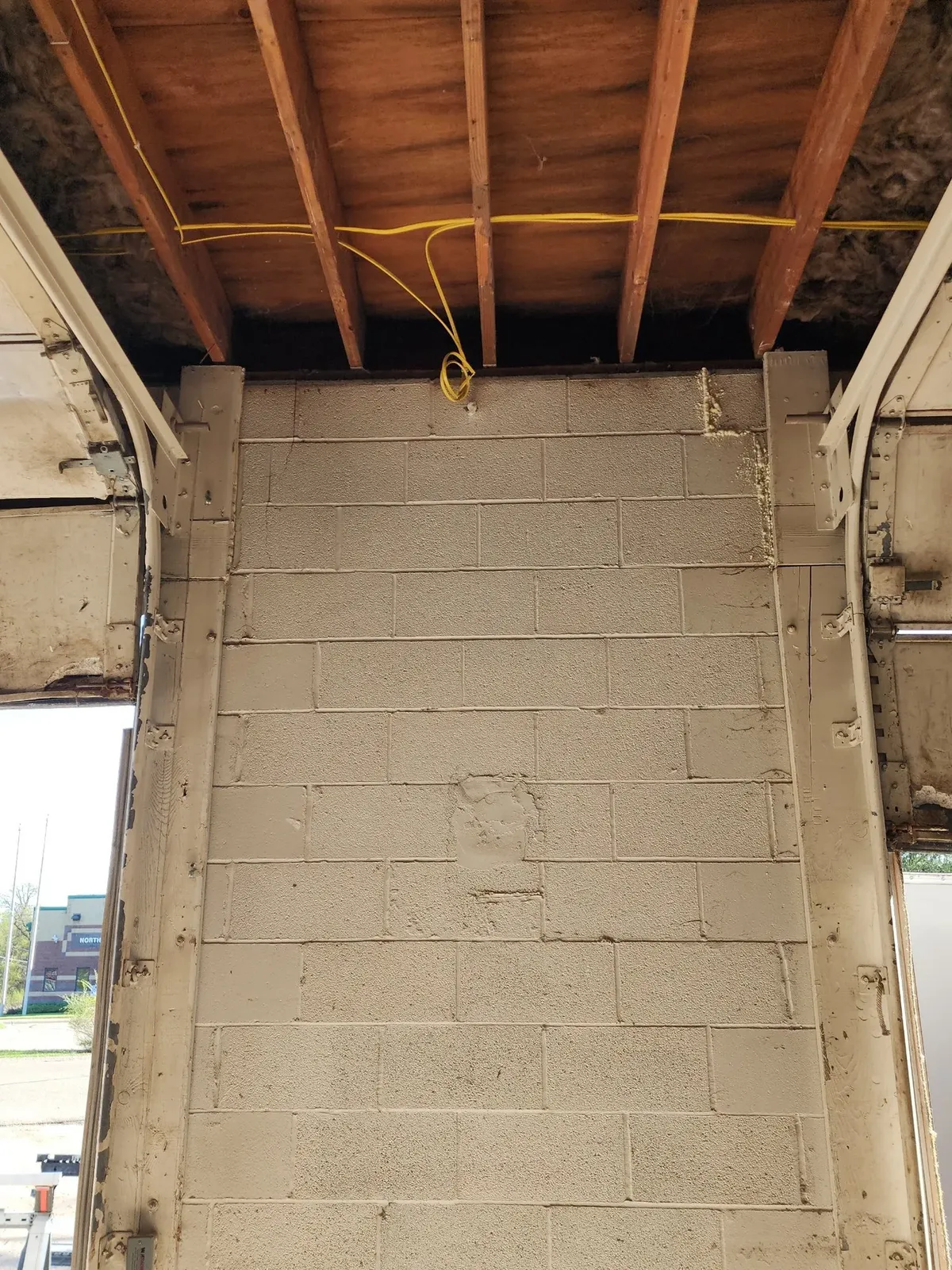 Exposed ceiling joists during the hockey performance center build-out