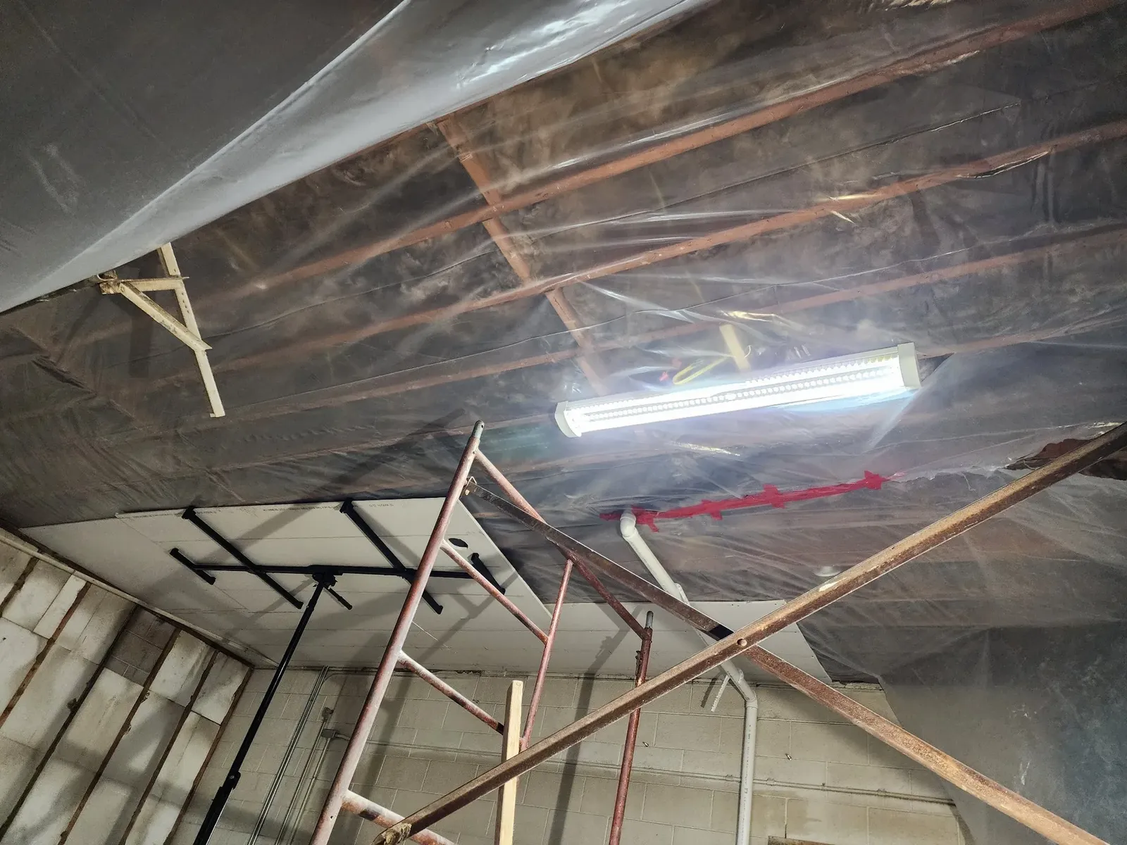 Ceiling vapor barrier installed during the hockey performance center build-out