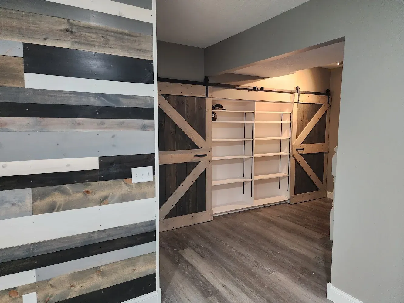 Finished barn doors with built-in shelving