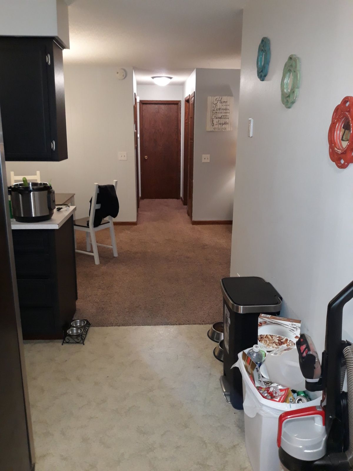 Kitchen and dining area before the main-floor remodel