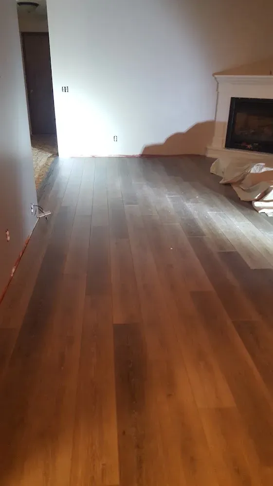 New main-floor flooring laid, with finishing work still underway