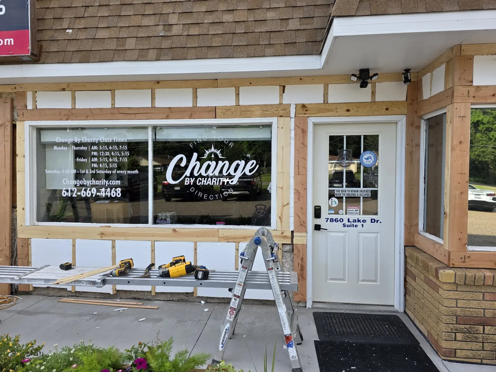 New framing installed around a storefront window and entry door
