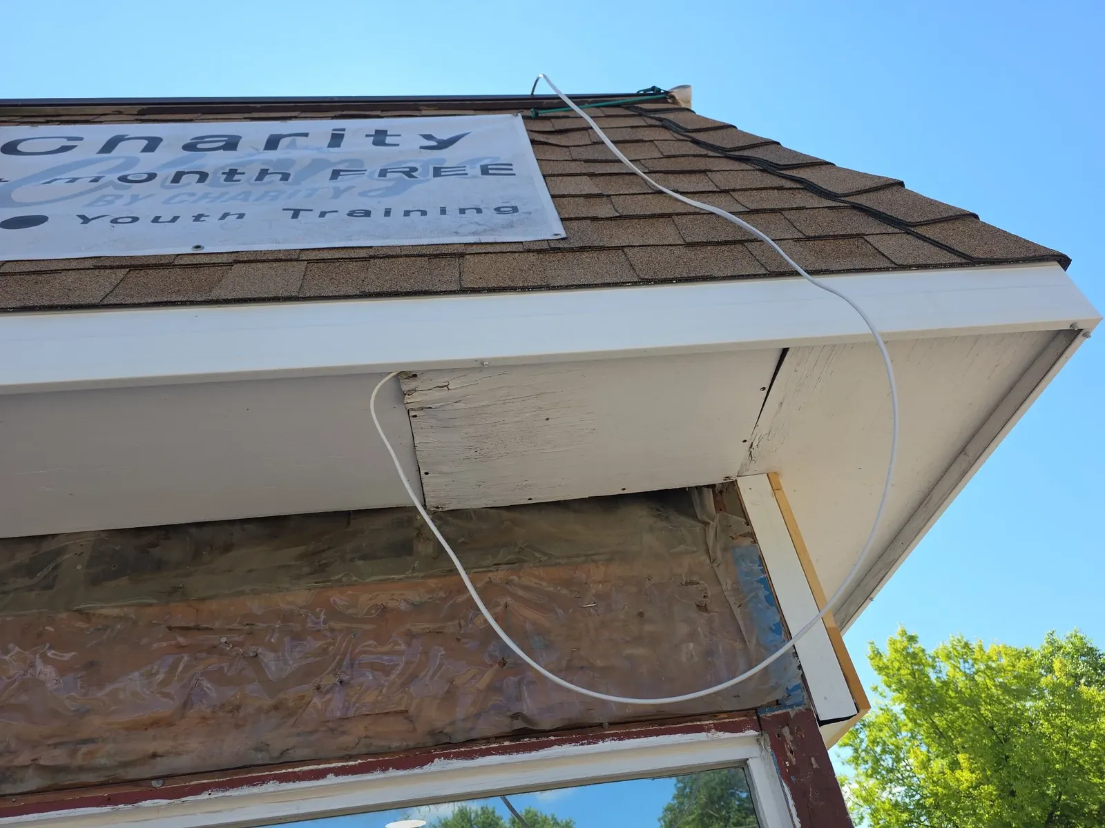 Damaged eave exposed during the performance center exterior renovation