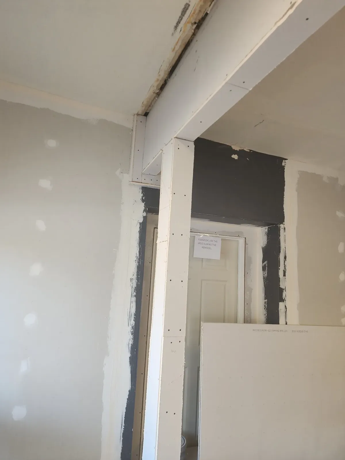 Close-up of drywall joint being mudded