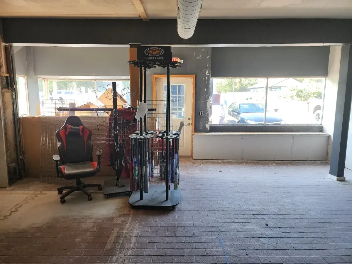 Commercial gym interior during the drywall finishing stage